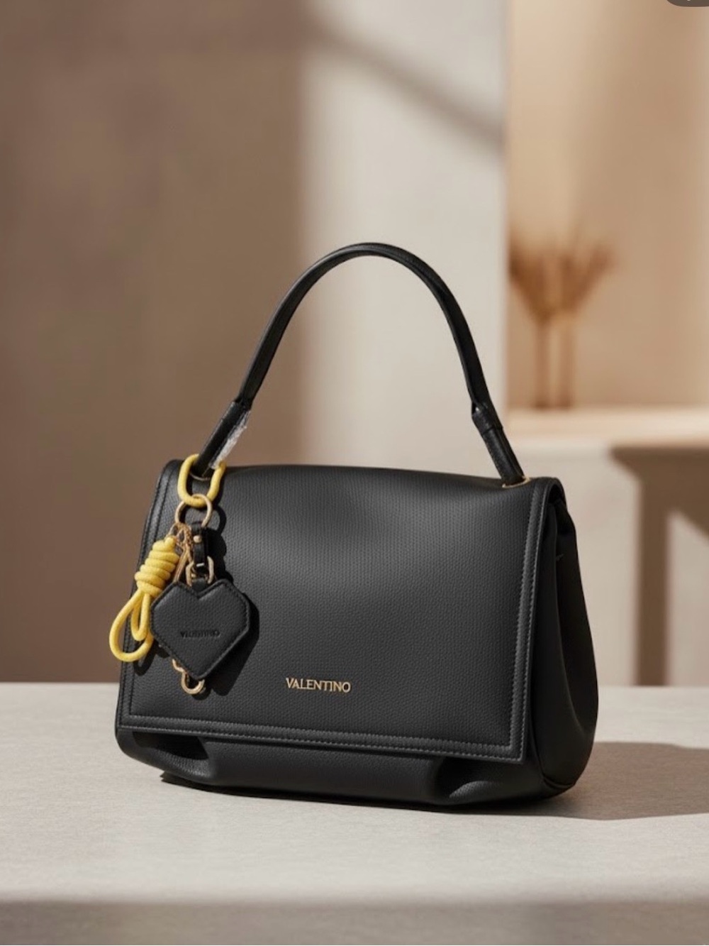 Mario Valentino Spa Black Leather Top-Handle Bag with Yellow Charm